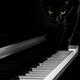 Black cat on piano keyboard... (thumbnail)