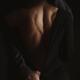 Romantic sensual portrait of couple embracing in dim dramatic light... (thumbnail)