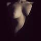 Nude woman body with dress cut revelaing her breast... (thumbnail)