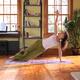 Young woman practicing yoga indoors... (thumbnail)