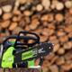 Electric Cordless Chainsaw and stacked firewood... (thumbnail)