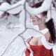 Woman in red kimono with bare shoulders in winter snow... (thumbnail)
