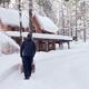 Man with snow blower clearing driveway in Canadian winter... (thumbnail)