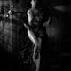 Beautiful nude woman covering her body with fan Black and white... (thumbnail)