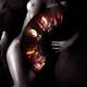 Beautiful naked woman body covered with oriental red fan Artistic nude... (thumbnail)