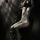 Beautiful nude woman with sakura cherry blossom body art tattoo