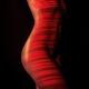 Woman body with red laser stripes on skin... (thumbnail)