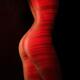Nude woman body with red laser stripes on skin... (thumbnail)