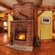 Timber frame Canadian house interior living room with fireplace... (thumbnail)