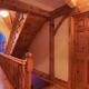 Timber frame cottage style Canadian house hall with wooden staircase... (thumbnail)
