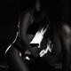 Sensual artistic photo of couple making love in front of fireplace Bla... (thumbnail)