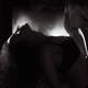 Sensual dynamic photo of couple making love in front of fireplace Blac... (thumbnail)