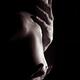 Sensual erotic closeup of man hands on nude woman breast and neck... (thumbnail)