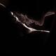 Sensual closeup of woman face kissing man nude body... (thumbnail)