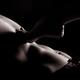 Woman foot on bare man chest sensual body parts closeup... (thumbnail)