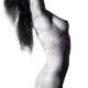 Nude woman body with light pattern of leaves on her skin... (thumbnail)