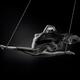 Nude woman swinging in splits in the air with bondage rope and flowing... (thumbnail)