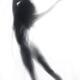 Beautiful surreal silhouette of a nude woman figure in glowing foggy l... (thumbnail)