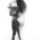 Sensual surreal portrait of a sexy nude kissing couple bodies behind s... (thumbnail)