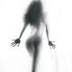 Abstract sensual woman silhouette behind white sheer curtain... (thumbnail)