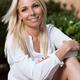 Portrait of a smiling woman with blond hair outdoors... (thumbnail)