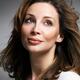 Beautiful woman with brown hair and daydreaming expression... (thumbnail)
