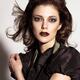 Beautiful woman with dramatic makeup expressive portrait... (thumbnail)