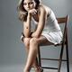 Attractive Thoughtful Young Woman on a Chair... (thumbnail)