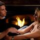 Young Couple at a Fireplace... (thumbnail)