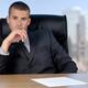 Businessman in his Office... (thumbnail)