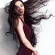 Beautiful asian woman with long flying in the wind black hair... (thumbnail)