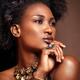 Beauty face portrait of black african american woman wearing jewelry... (thumbnail)