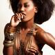 Beautiful Black African Woman Wearing Jewelry over her Bare Body... (thumbnail)