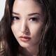 Beautiful young asian woman closeup of face... (thumbnail)