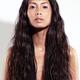 Artistic beauty portrait of a young exotic woman face with long dark h... (thumbnail)