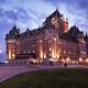 Fairmont Le Château Frontenac lit by street lights at dusk in Old Que... (thumbnail)