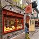 Woman looking at Pot en Ciel shop display on Rue du Petit Champlain hi... (thumbnail)