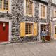 Woman walking out of Amimoc shoe store on Rue de Petit Champlain Stree... (thumbnail)