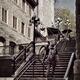 Person walking up the stairs of historic street Rue du Petit Champlain... (thumbnail)