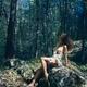 Beautiful half naked sexy young woman in a forest sensual artistic por... (thumbnail)