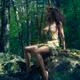 Beautiful woman in a sexy revealing dress in a forest erotic portrait... (thumbnail)