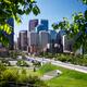 Calgary city downtown skyline and Centre Street Bridge framed by green... (thumbnail)