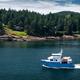 Boat going past Galiano Island near Vancouver Island BC... (thumbnail)