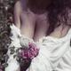 Sensual closeup of a woman with wet hair in rose garden in rain... (thumbnail)