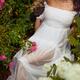 Romantic sensual photo of a beautiful woman in wet dress lying under a... (thumbnail)