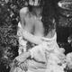 Sensual black and white portrait of a beautiful woman in wet clothes s... (thumbnail)