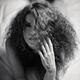 Sensual expressive portrait of a woman lying on a bed Black and white... (thumbnail)