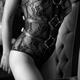 Sexy woman body in black lacy underwear and leather bondage straps Bla... (thumbnail)