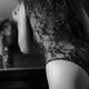Sensual black and white boudoir closeup of woman in sexy underwear lea... (thumbnail)