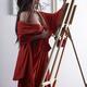 Asian woman sumi-e artist in red kimono painting in her studio artisti... (thumbnail)